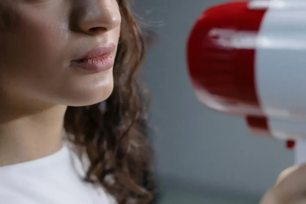 Person tracking progress in a journal, symbolizing measurement and improvement